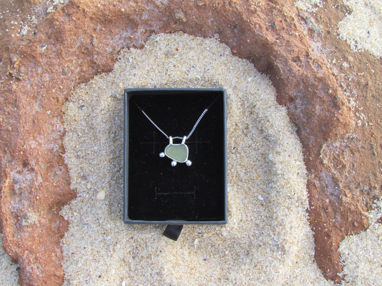 Tidal green pendant