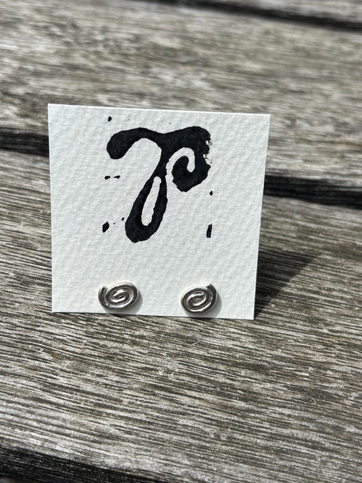 14- Swirl Studs